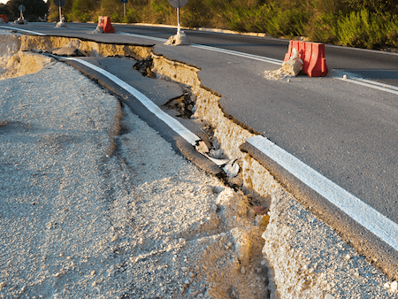 Earthquake damage on a road