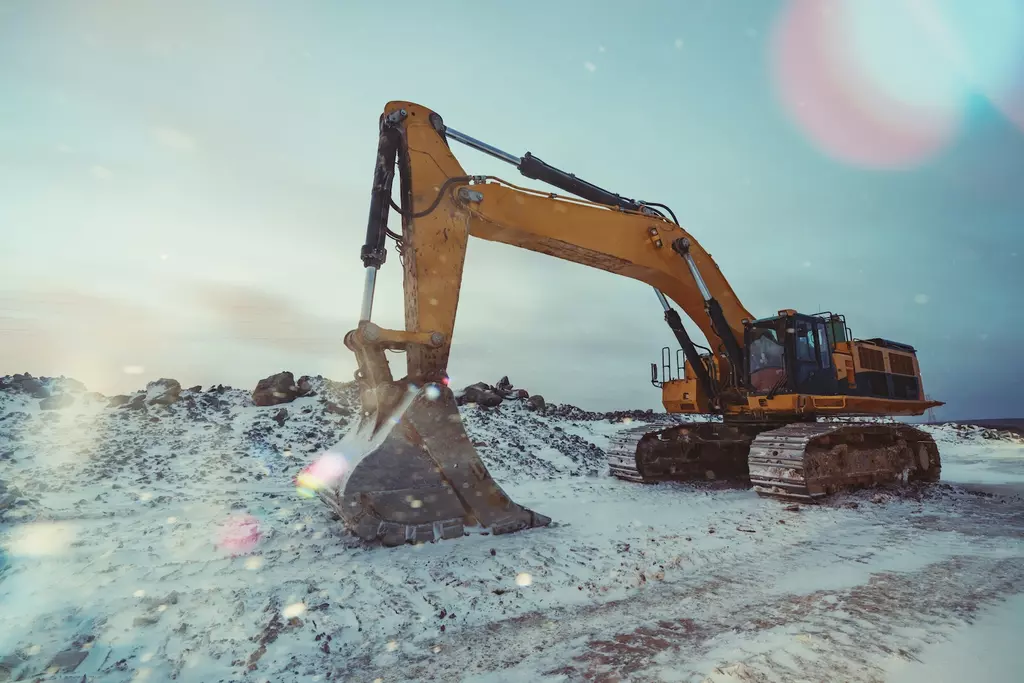 excavator in the snow